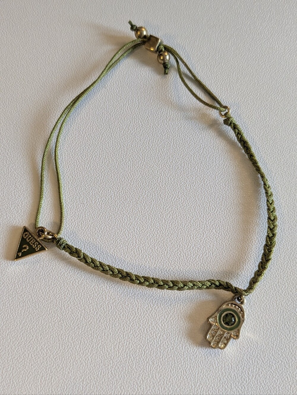 Guess Braided Bracelet Evil Eye Hamsa Hand And Guess Triangle Charms Green Gold